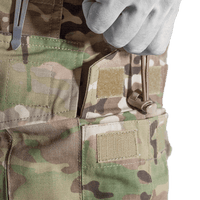A pair of Crye G3 Combat Pants in Multicam camouflage pattern, designed for military and outdoor use with multiple pockets and reinforced areas.