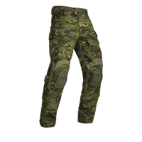 A pair of Crye G3 Combat Pants in Multicam Tropic camouflage pattern, designed for military and outdoor use with multiple pockets and reinforced areas.